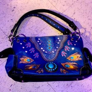 Turquoise leather concealed shoulder bag